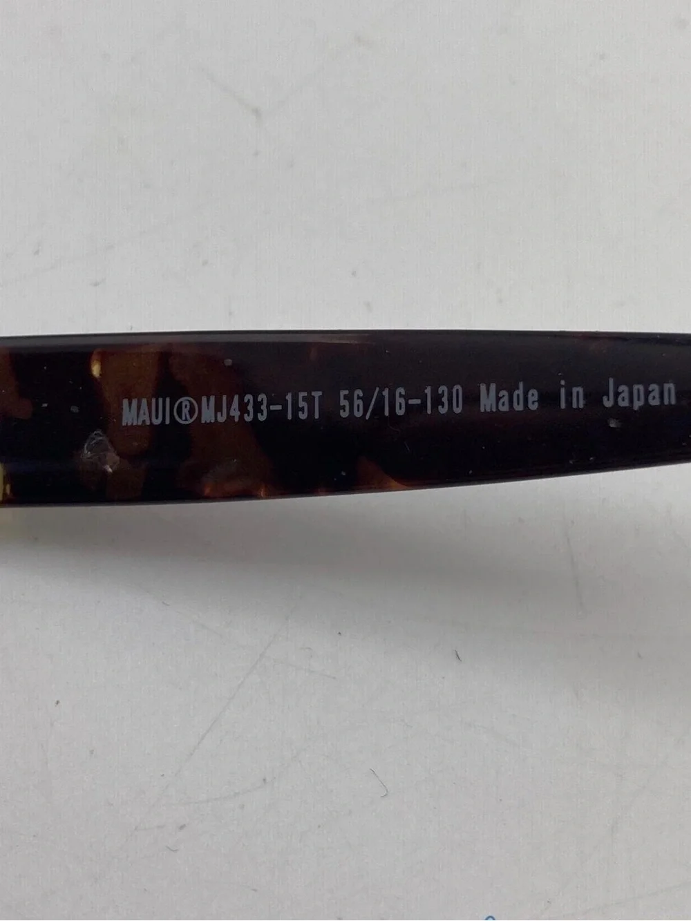 Maui Jim Black Frame Sunglasses with Brown Lenses